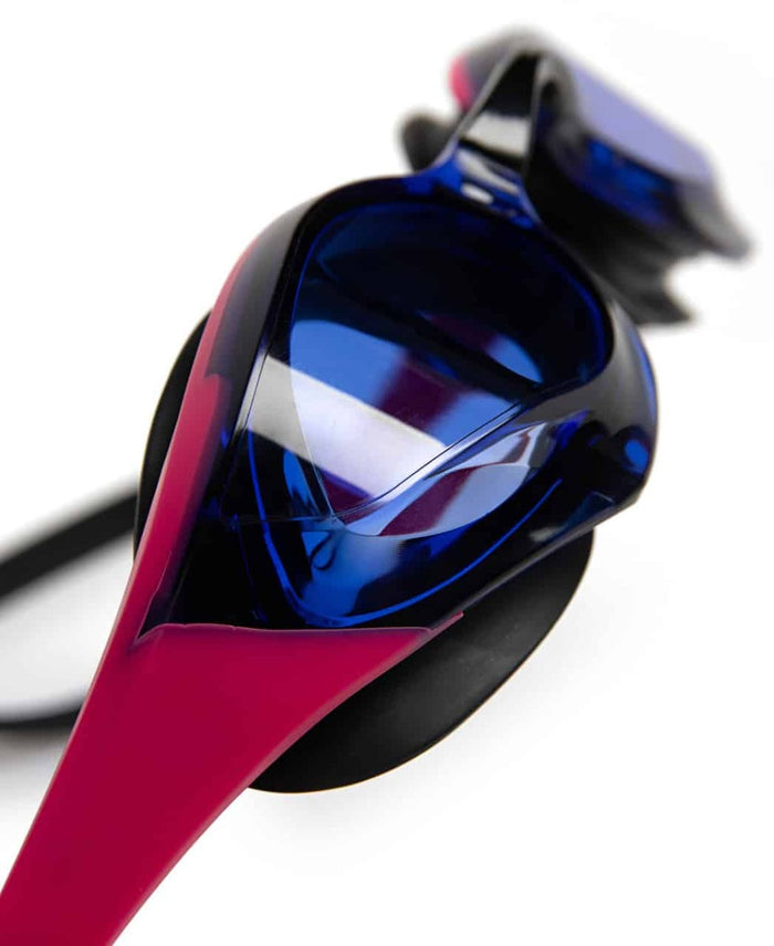 Arena Cobra Edge Swipe racing goggles in blue, violet, pink, and black with a sleek design and adjustable strap.