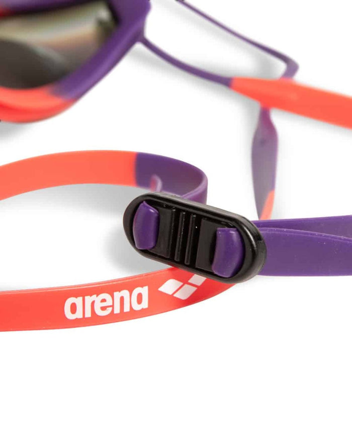Arena Tracks Mirror Racing Goggles in copper, plum, and coral with reflective lenses designed for competitive swimming.