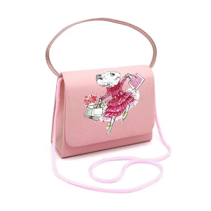 Claris pink mini handbag detail showing gold magnetic snap closure and character artwork