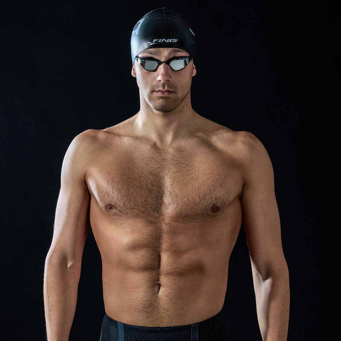 Finis Mach 1 Titanium racing goggles with adjustable strap and tinted lenses, designed for competitive swimming.