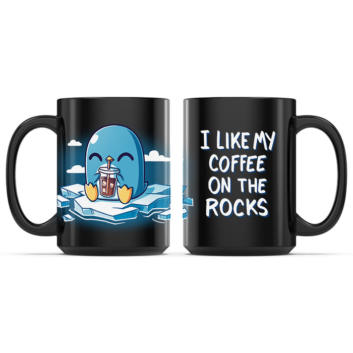 Ceramic Mug_TeeTurtle I Like My Coffee on the Rocks black mug featuring a penguin drinking coffee on an iceberg.