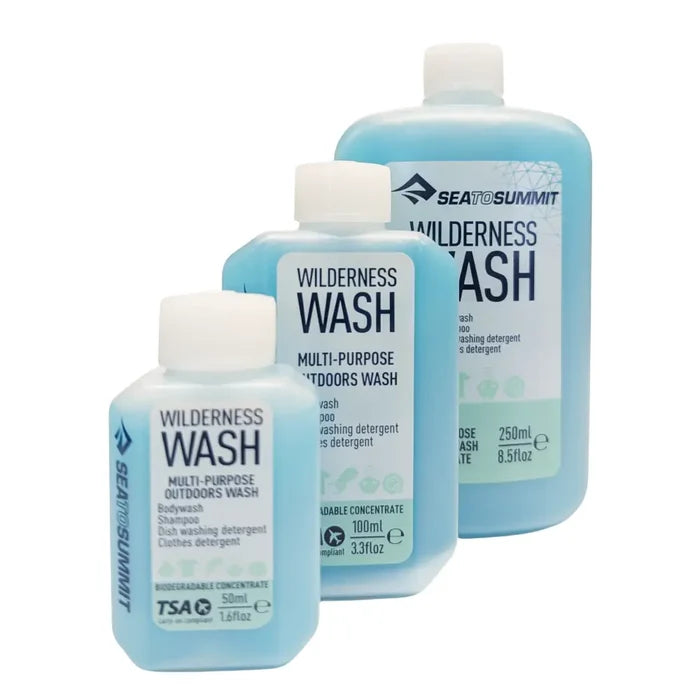 Three Sea to Summit Wilderness Wash multi-purpose outdoor wash bottles in 50ml, 100ml, and 250ml sizes, arranged by size on a white background.