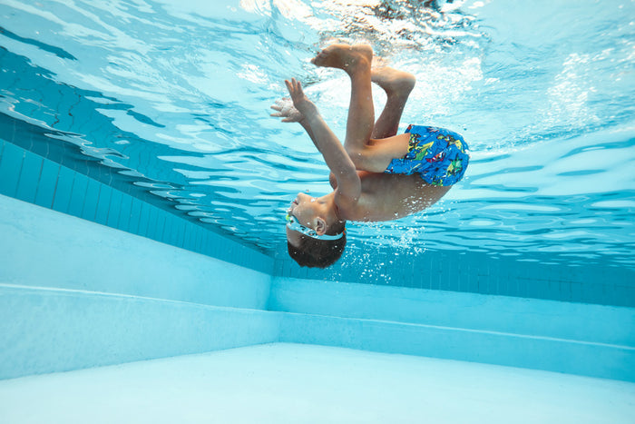 Blue Speedo infant illusion goggles with adjustable strap and clear lenses, designed for young swimmers.