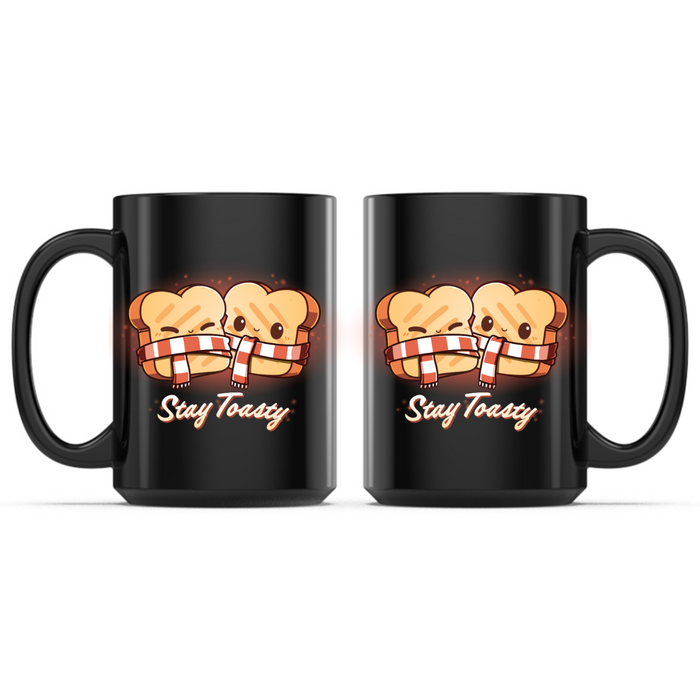 Ceramic Mug_TeeTurtle Stay Toasty Mug black mug featuring two smiling slices of toast wrapped together in a cozy striped scarf above the phrase "Stay Toasty."