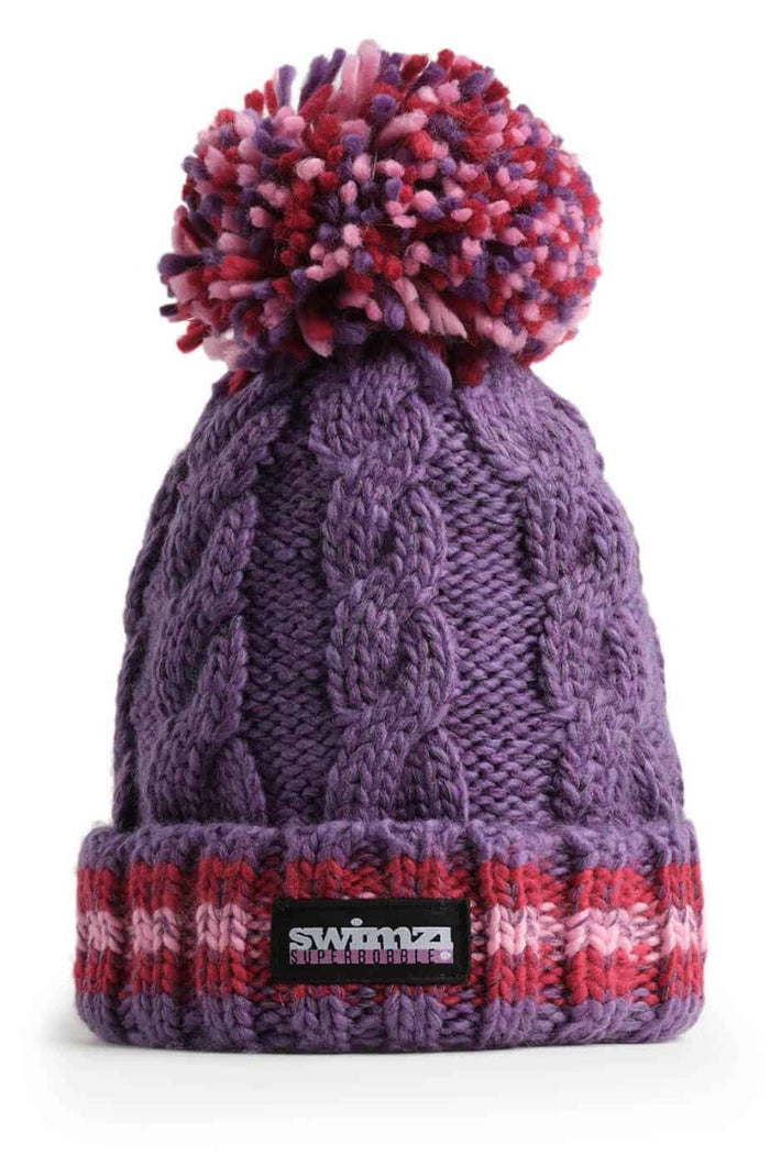 Purple Swimzi Berries Cable Reflective Super Bobble Hat, a cozy knit cap with a large pom-pom and reflective details for winter warmth.
