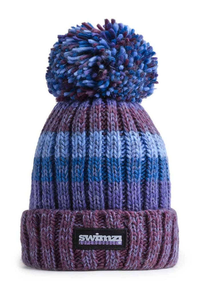 Swimzi Berries Gradient Super Bobble Hat in purple, cozy knit hat with colorful berry pattern and large pom-pom on top.