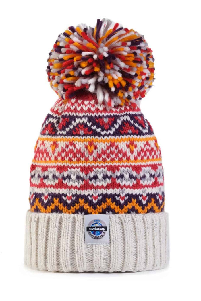 Swimzi Cream Cherry Fairisle Super Bobble Hat, colorful knit hat with pom-pom, for kids’ winter warmth and style.