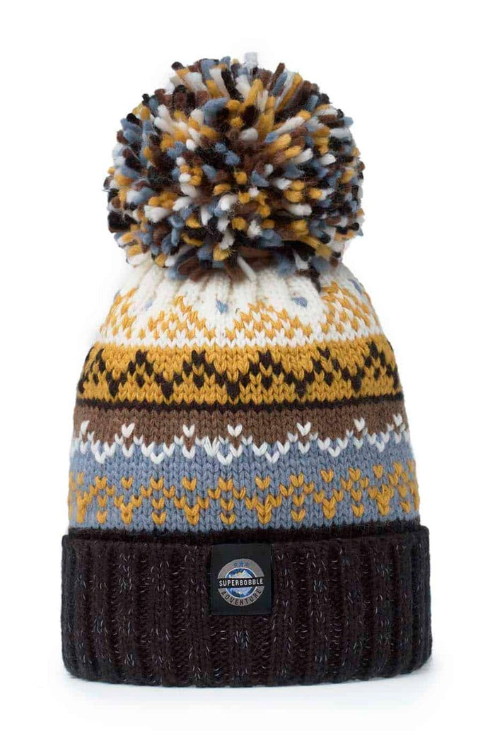 Swimzi Midnight Sun Nordic Knit Super Bobble Hat in multi colors, warm winter hat with a large pom-pom and cozy knit texture.