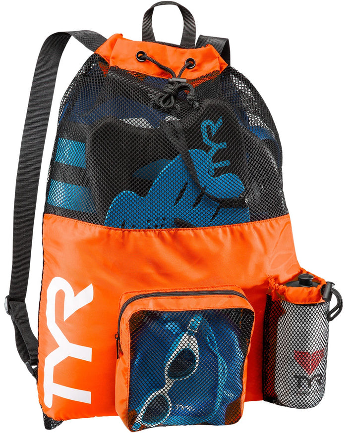 Orange TYR Big Mesh Mummy Backpack, a durable mesh bag with a spacious design ideal for swimming gear and sports equipment.