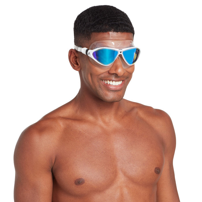 Zoggs Horizon Flex Titanium swimming goggles with clear, white frame and mirrored blue lenses, designed for comfortable fit and visibility.