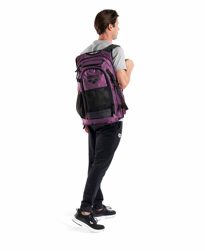 Arena All Set Backpack 45L in plum color with multiple compartments and adjustable straps, designed for versatile travel and sports use.