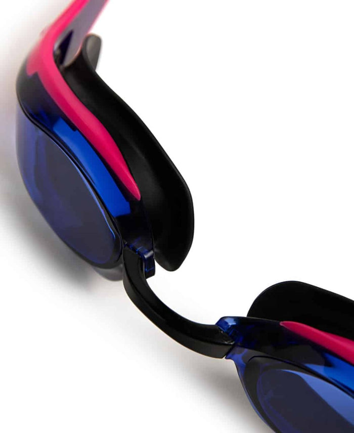 Arena Cobra Edge Swipe Racing Goggles in blue, violet, pink, and black with sleek, aerodynamic design for competitive swimming.