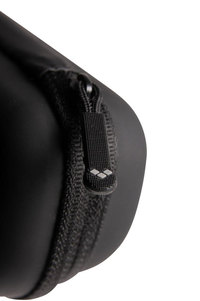Arena goggle case in black and purple, designed to protect and store swimming goggles with a durable, compact case.