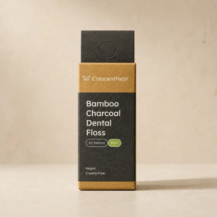 Crescent Nest bamboo charcoal dental floss in retail packaging