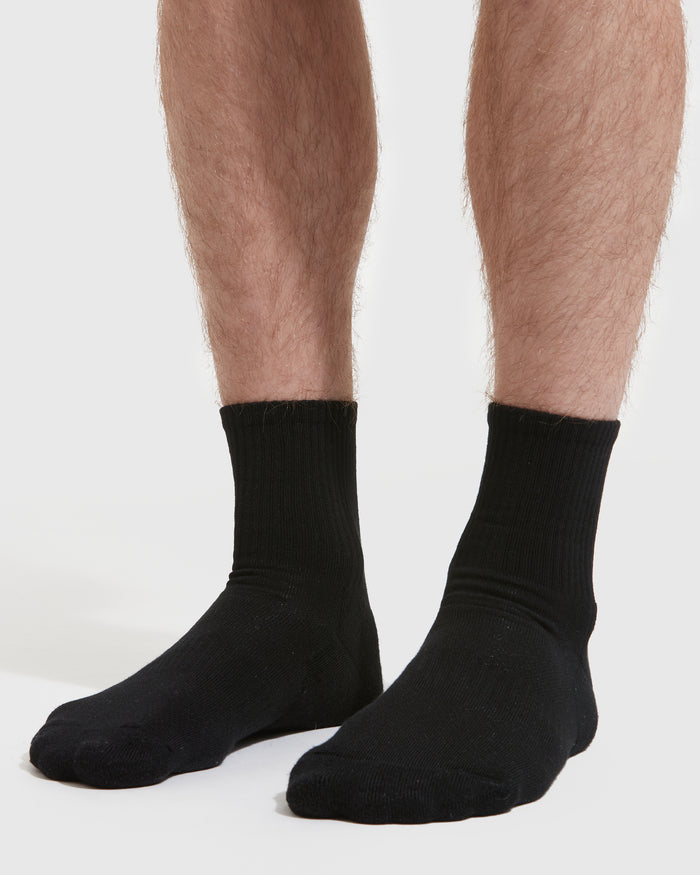 Black Half Crew Socks 3-Pack worn, showcasing seamless toe and contour seam.