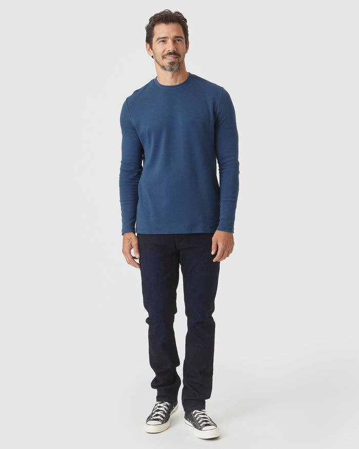 Deep Sea Blue Long Sleeve Waffle Crew on man with jeans and sneakers.
