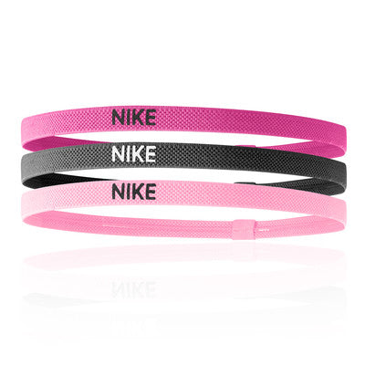 Set of three Nike Elastic Headbands 2.0 for hair, featuring comfortable, stretchable material in various colors.
