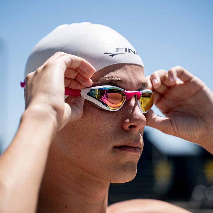 Finis Mach 1 Racing Goggle in Pink Opal with adjustable strap and clear lens for competitive swimming.