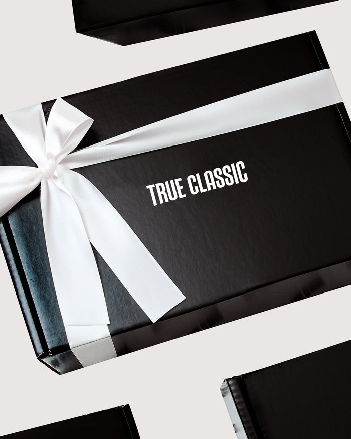Gift Box with TRUE CLASSIC text and white satin ribbon.