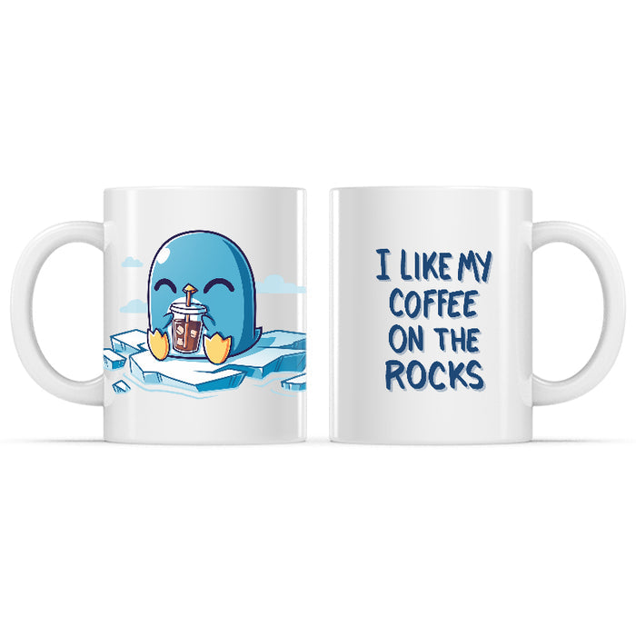 Ceramic Mug_TeeTurtle I Like My Coffee on the Rocks white mug featuring a penguin drinking coffee on an iceberg.