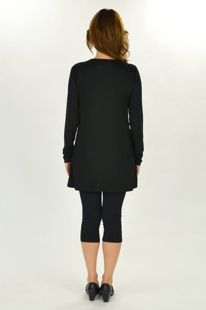Jenny May Lady in Waiting Tunic Top, shown in beige with long sleeves and relaxed fit on a model.