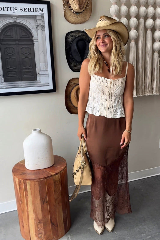 Brown satin midi skirt with sheer lace panels at the hem