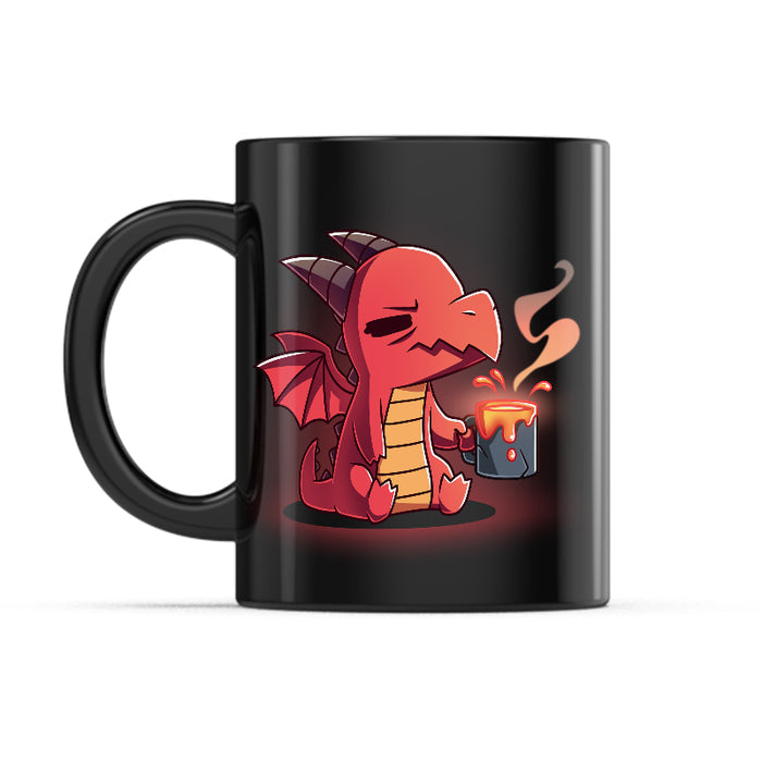 Ceramic Mug_TeeTurtle Morning Magma black mug featuring a sleepy dragon holding a cup of coffee.