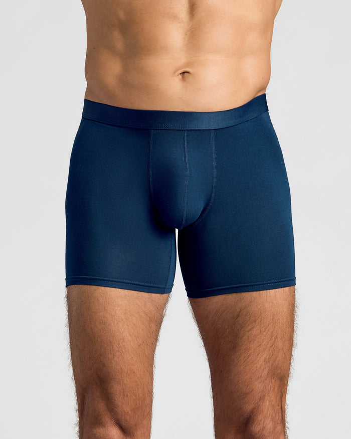 Man wearing Navy Boxer Brief with supportive 3D pouch and elastic waistband.