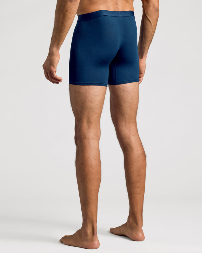 Navy Boxer Brief on man, rear view, showing fit and waistband.