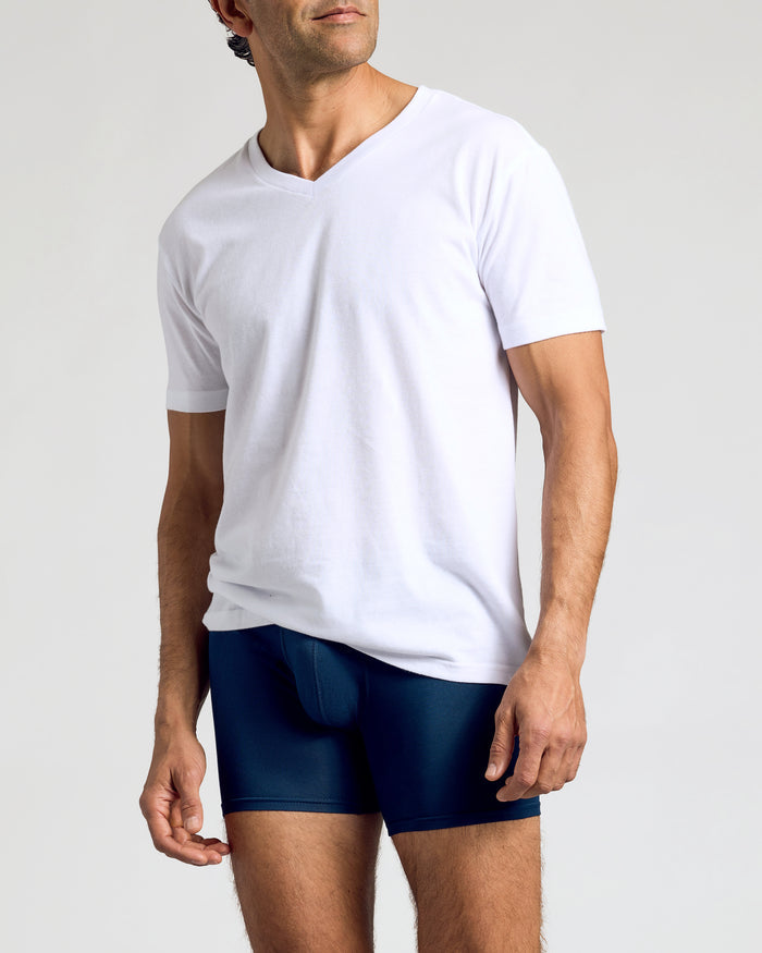Man wearing plain white V-neck T-shirt and Navy Boxer Briefs.