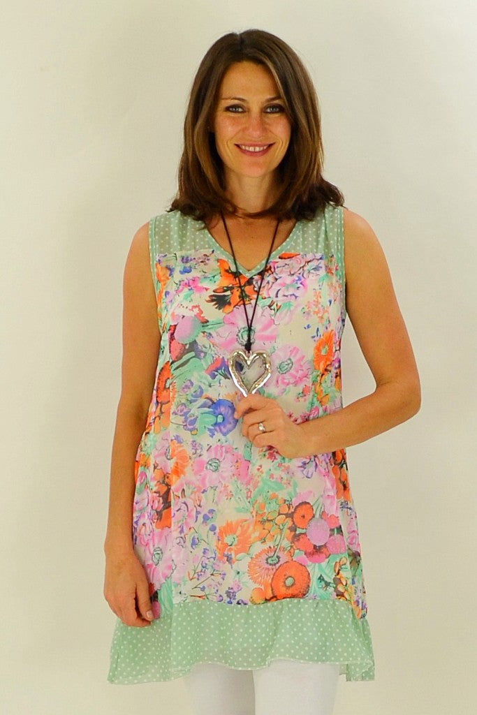 Orange Meadow Flowers Tunic by Whispers featuring a flowy silhouette and vibrant floral pattern on lightweight fabric.