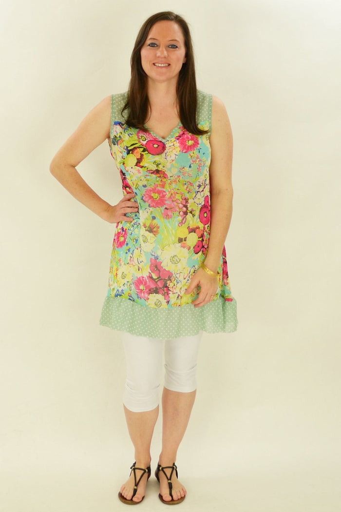Pink Meadow Flowers Whispers tunic featuring a floral print, lightweight fabric, and relaxed fit, perfect for casual wear.