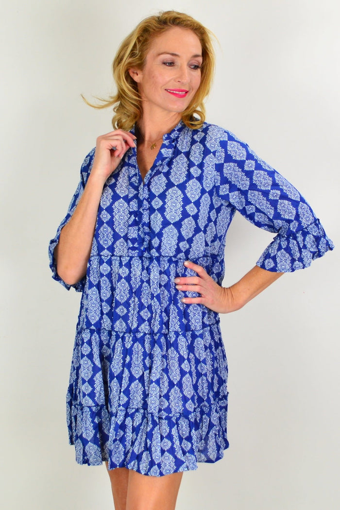 Blue tiered tunic dress by One Summer, featuring a flowy, stylish design and casual fit, perfect for summer wear.