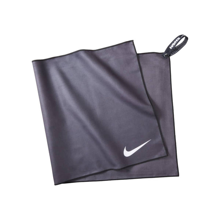 Black Nike Quick Dry Swim Towel displayed flat, showcasing its lightweight, quick-drying fabric and compact design for swimmers.
