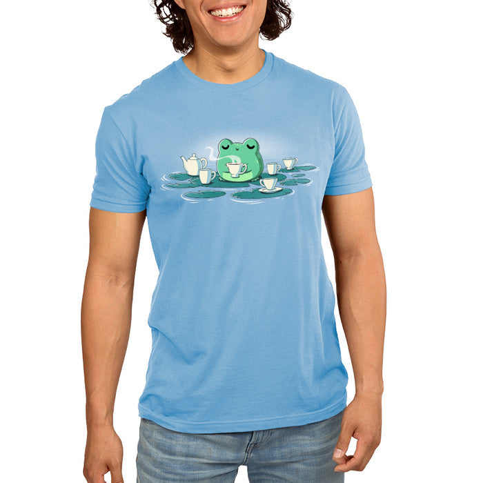 Premium Cotton T-shirt_TeeTurtle light blue Ribbit and Sip apparel featuring a frog drinking coffee sitting on a lily pad surrounded by lily pads with coffee cups on them.