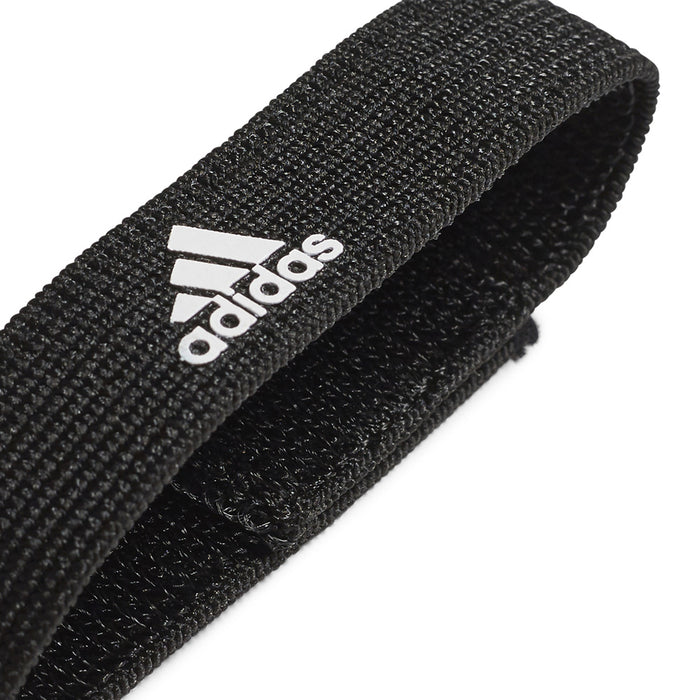 Black Adidas sock holder designed for organizing slides and sports socks, featuring the Adidas logo and adjustable strap for secure fit.