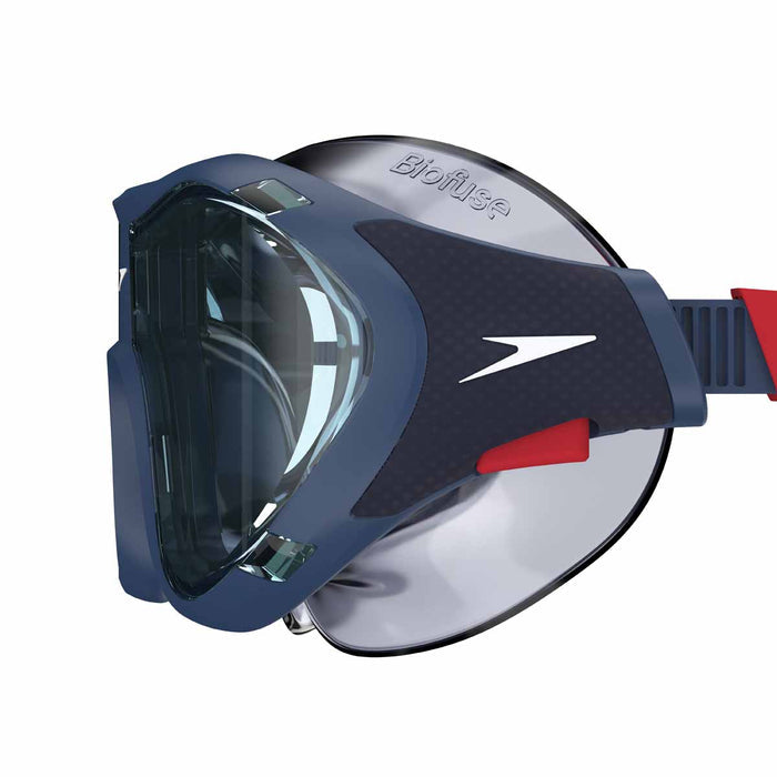 Speedo Biofuse 2.0 navy goggles with adjustable straps and clear lenses for swimming comfort and protection.