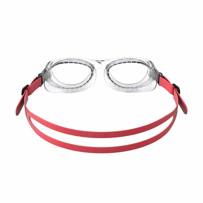 Speedo Futura Classic Junior swimming goggles in red and clear with adjustable straps and sleek design for kids' swimming.