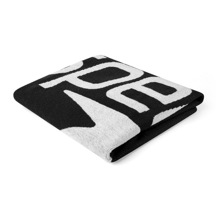 Black and white Speedo logo towel with soft, absorbent fabric, perfect for swimming and beach days.