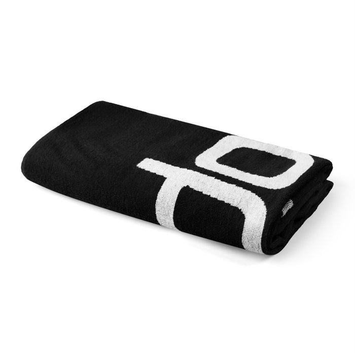 Speedo logo towel in black and white, soft and absorbent, featuring the Speedo brand logo on a stylish towel.
