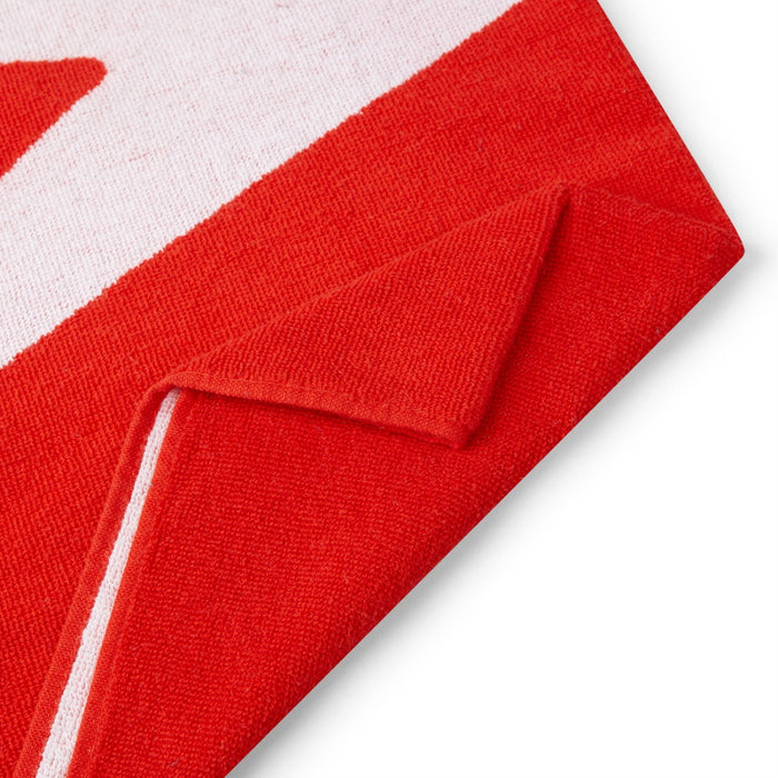 Red and white Speedo Logo towel with bold branding, made of soft, absorbent fabric, perfect for swimming and beach use.
