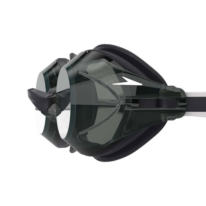 Speedo Vanquisher 3.0 swimming goggles in black and smoke with adjustable straps and clear lenses for competitive swimming.