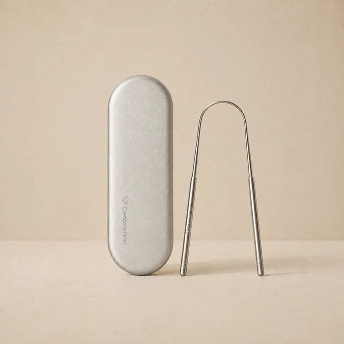 Crescent Nest stainless steel tongue scraper and silver travel case