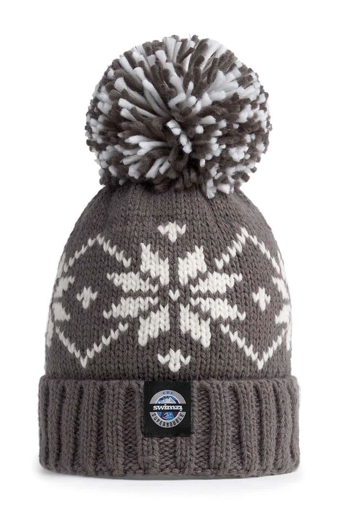 Swimzi Slate Flora Nordic knit reflective super bobble hat in grey, cozy hat with floral pattern and pom-pom detail.