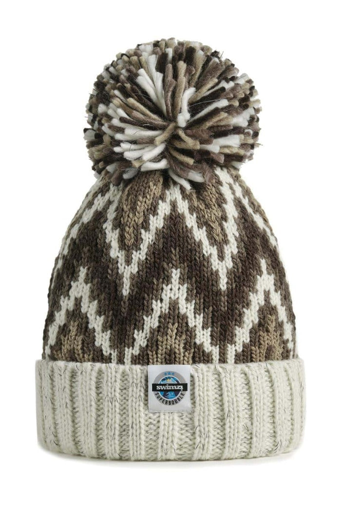 Swimzi Truffle Cream Zig-Zag Super Bobble Hat in brown, a cozy knit hat with bold zig-zag pattern and large bobble for warmth and style