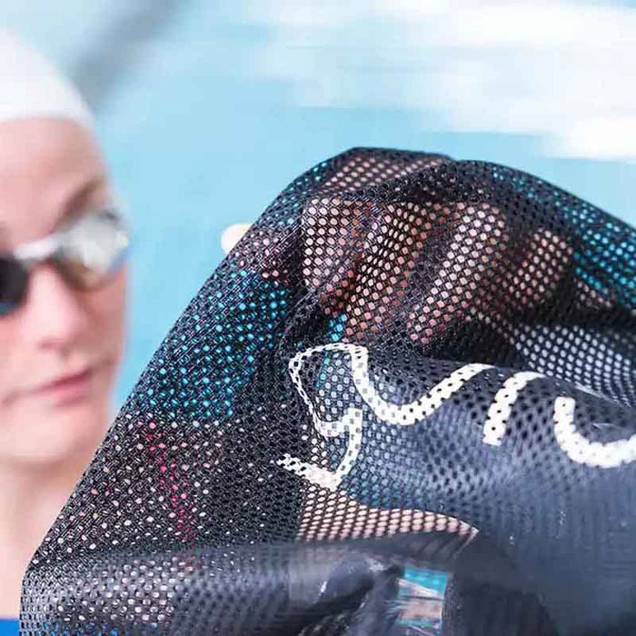 Black TheMagic5 Equipment Mesh Bag with a durable mesh design for organized storage of sports gear or accessories.
