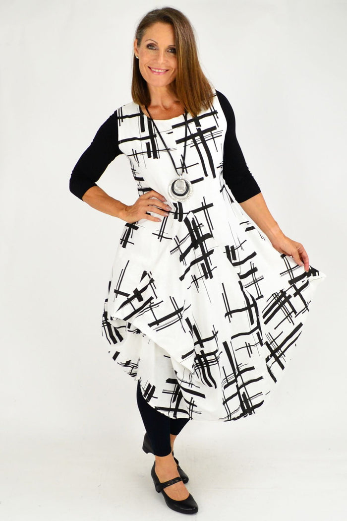 White Coby Panel cotton tunic dress by I Love Tunics, featuring a relaxed fit and panel design, displayed on a hanger.