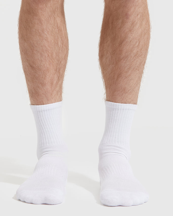 White Half Crew Socks 3-Pack on bare legs, showcasing seamless toe and contour seam.